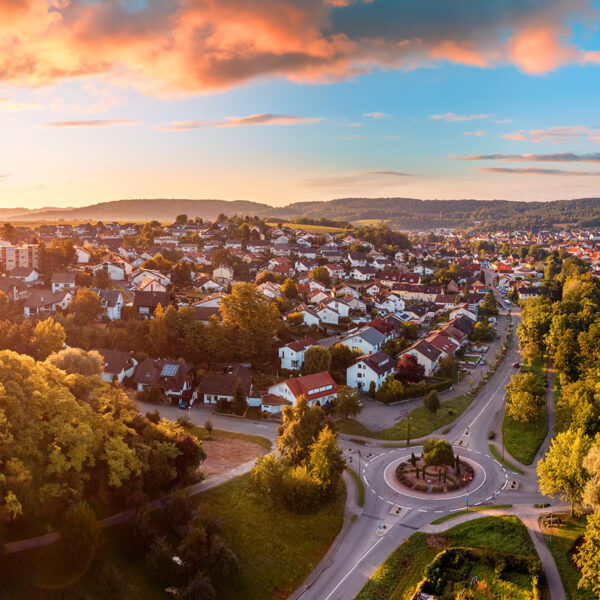 Aerial panorama of a European town at sunrise